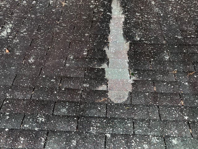 Armonk roof cleaning, Dirty roof with black streaks, black marks, moss, mold, mildew., lichens, asphalt roof, shingle roof- Westchester Power Washing Roof shampoo and roof soft washing experts.