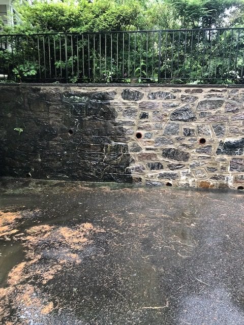 Katonah Bedford, Bedford Hills Somers, pressure washing, roof cleaning- stone wall pressure washed, black marks, oil, dirt, moss, mold, mildew, fungi, algae, soot, stains